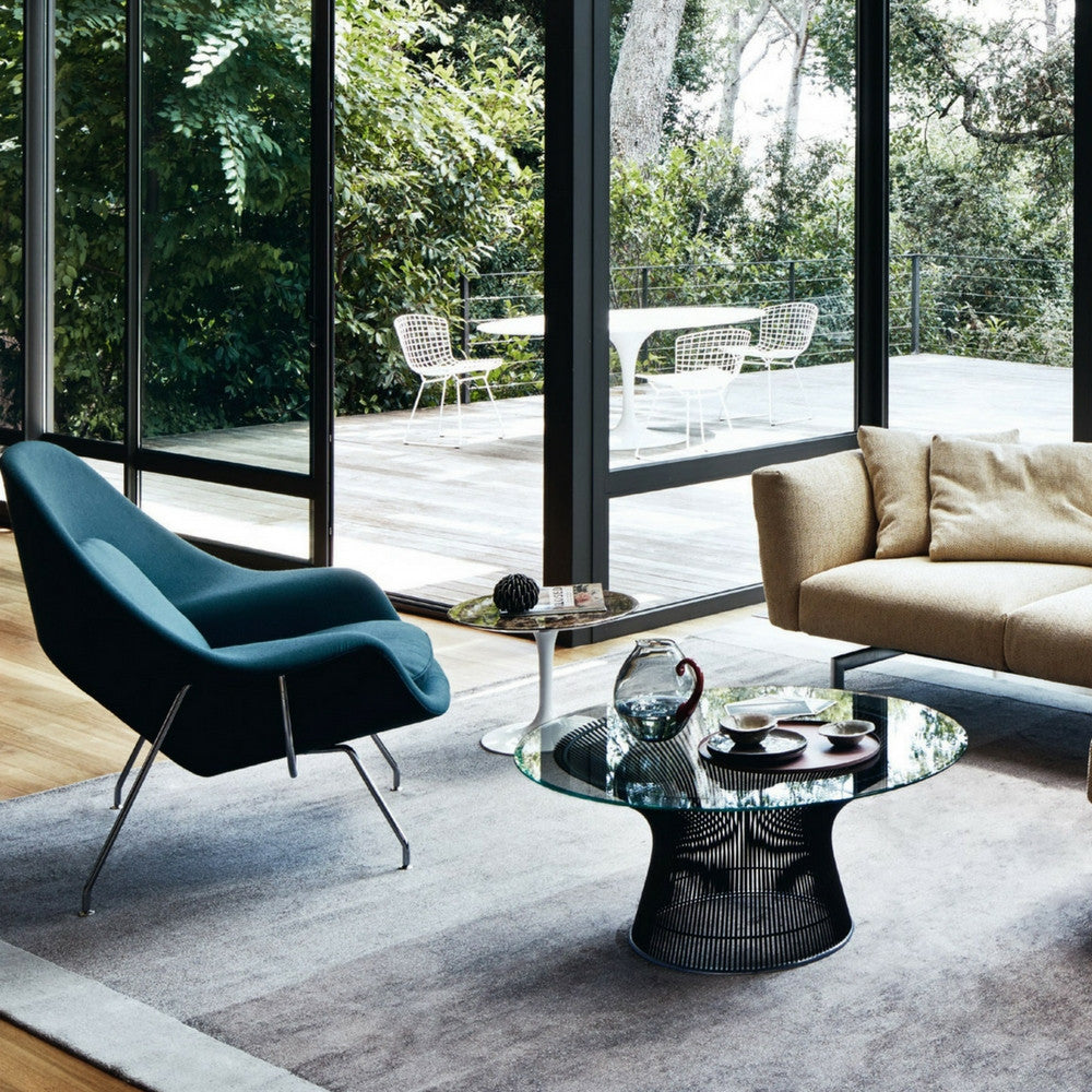 Knoll Womb Chair in living room with Saarinen side table and Platner coffee table