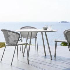 Caneline Lean Chairs Light Grey Outdoors by the Sea