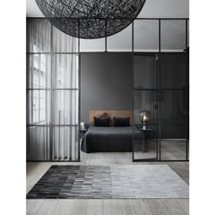 Linie Design Fade Grey Cowhide Rug in Bedroom