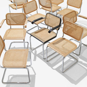 Ebonized Beech Cesca Armchair by Marcel Breuer along with Clear Beech Cesca Armless Chairs by Knoll