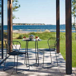 Black Resö Chair and Resö Chair with Sunbrella Seat by Matilda Lindblom for Skargaarden