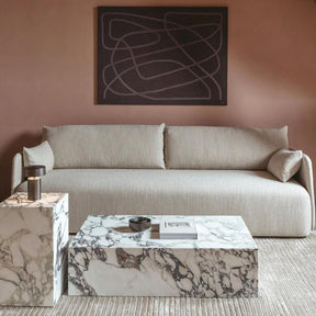 Menu Plinth Marble Coffee Tables in living room with Offset Sofa Norm Architects Copenhagen