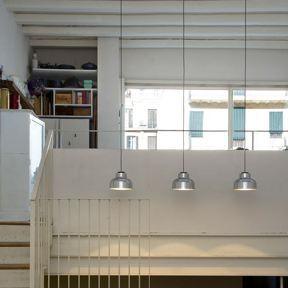 Miguel Milá M64 Polished Aluminum Suspension Lamps in Stairwell by Santa & Cole