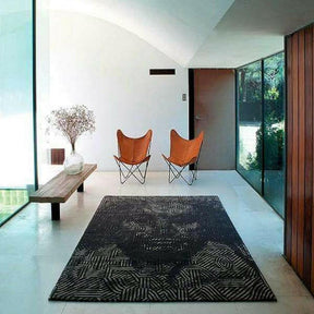 NaniMarquina Milton Glaser African Pattern Rug with Shakespeare's face in situ with Butterfly chairs