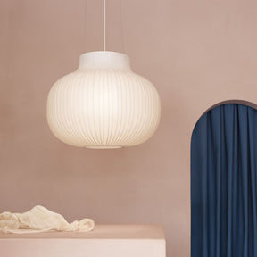 Muuto Strand Pendant Light in room with Rose Colored Walls
