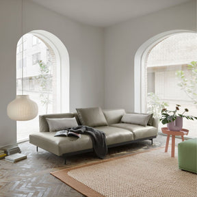 Muuto Strand Pendant Light in living room with In Situ Sofa and Pebble Rug