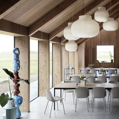 Muuto Strand Pendant Lights in Open Air Restaurant with Fiber Chairs