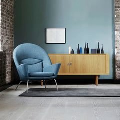 Blue Wegner Oculus Chair in Room with Woodlines Rug and Oak Credenza Carl Hansen and Son