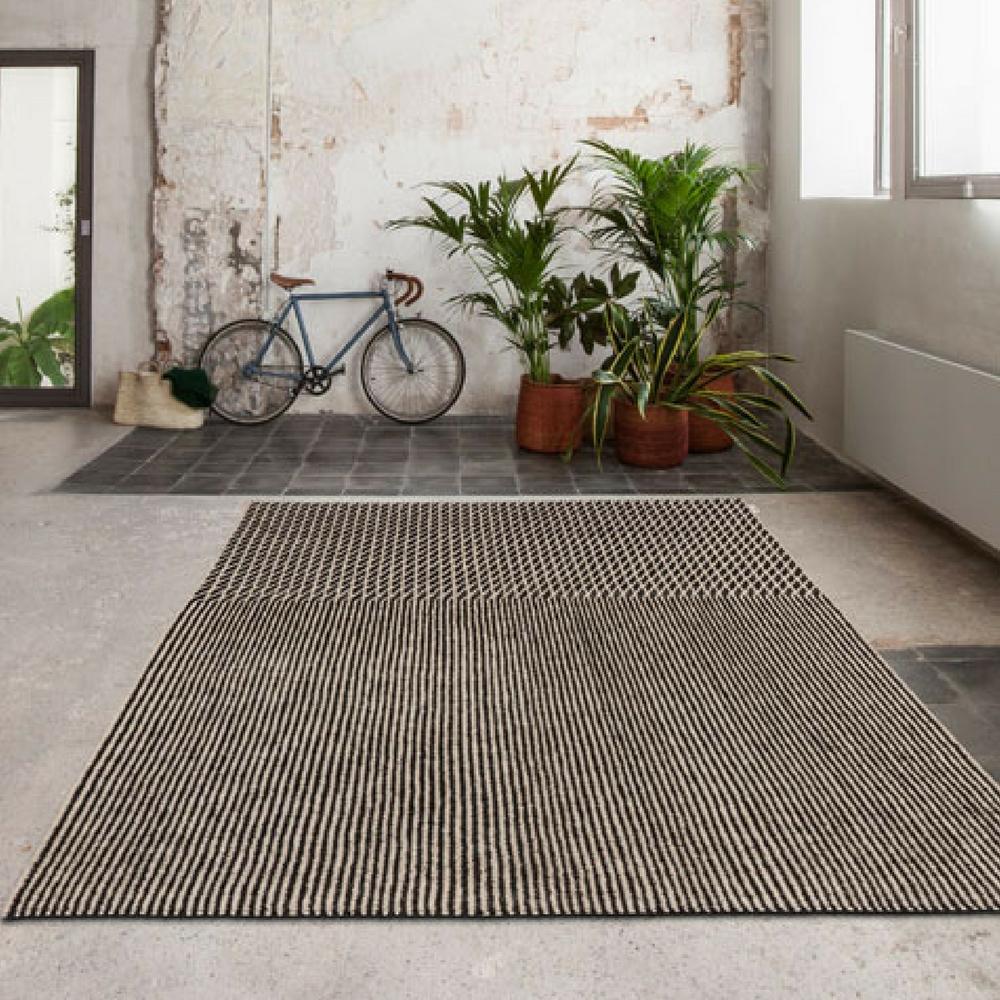 Nanimarquina Blur Rug Black in Room with Bicycle
