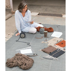 Nani Marquina studying materials for Mia rug collection