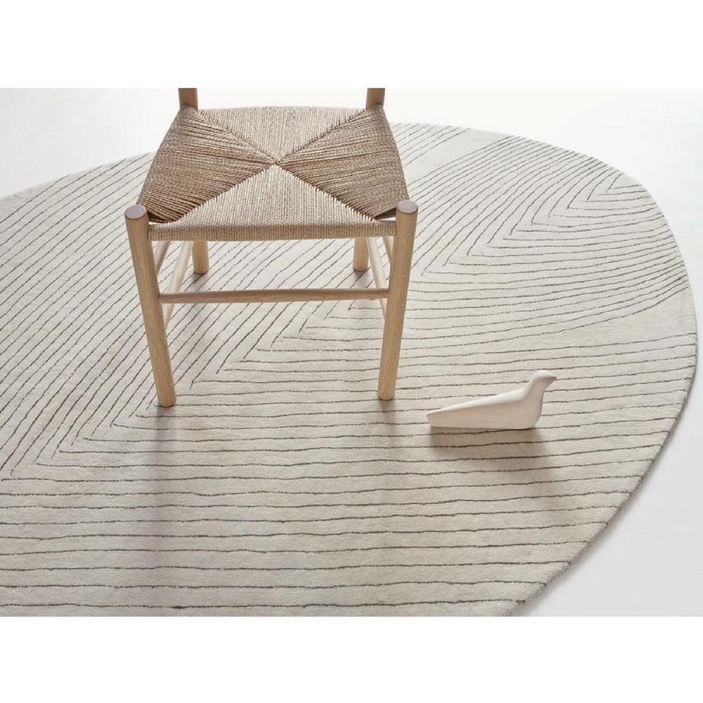 Nani Marquina Quill Rug Large with Hans Wegner stool and Bouroullec L'oiseau
