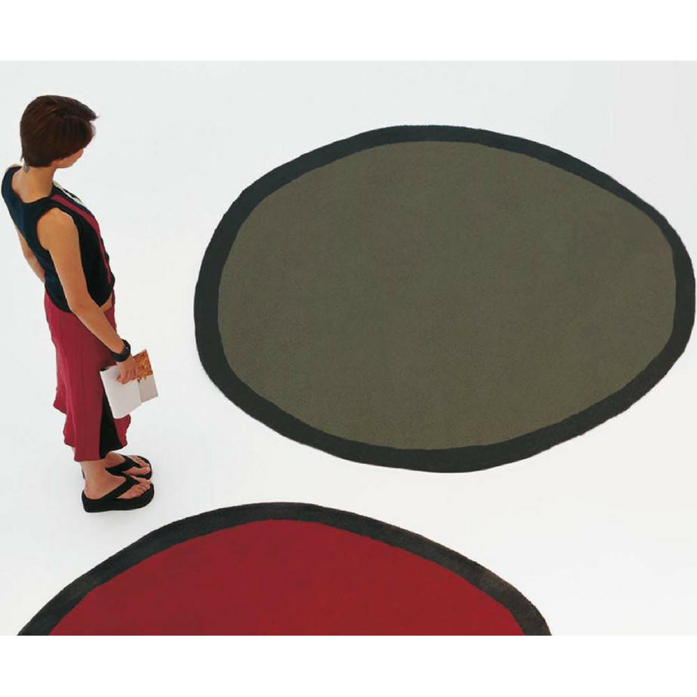 Nanimarquina Round Aros Rugs with Woman