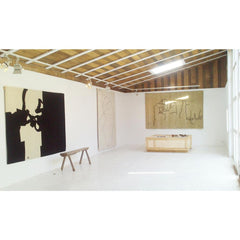 Eduardo Chillida Manoa Rug in Art Gallery with Mano and Collage Rugs by NaniMarquina