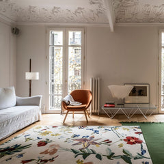 Nanimarquina Flora Promenade Rug in Barcelona living room with Colors Rug in Basil