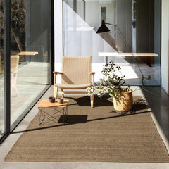 Nanimarquina Herb Rug in room with Hans Wegner CH25 Chair and Mantis Floor Lamp