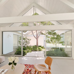 Nanimarquina Losanges Rug in Eichler Twin Gable House architect Ryan Leidner Joe Fletcher Photography with Courtyard View