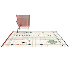 Nanimarquina Rabari Rug by Doshi Levien styled with pink chair