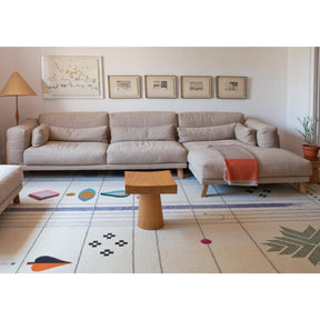 Nanimarquina Rabari rug by Doshi Levien in living room with sectional sofa