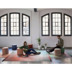 Nanimarquina Shade Rugs and Shade Poufs in loft with people