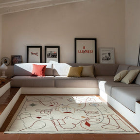 Nanimarquina Silhouette Rug by Jaime Hayon in Living Room with custom sofa.