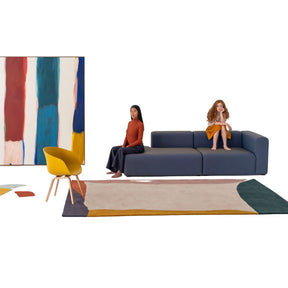 nanimarquina Tones 1 Rug in room with girls on sofa and painting