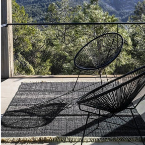 Nanimarquina Tres Outdoor Texture Rug Black on Balcony