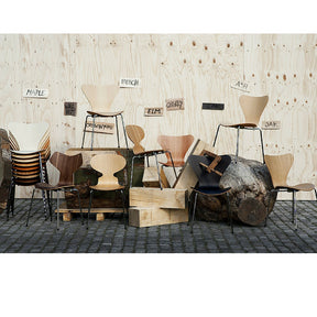 Grand Prix with Arne Jacobsen Stacking Chairs in Different Woods Fritz Hansen