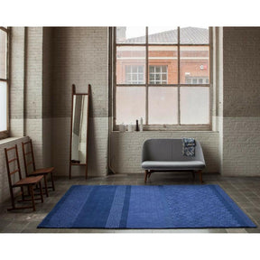 Neri and Hu Blue Jie Rug by Nani Marquina in Room with Ilse Crawford Rocking Chairs