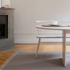 Norm Architects Pennon Dining Table in dining room with L.Ercolani Loveseat