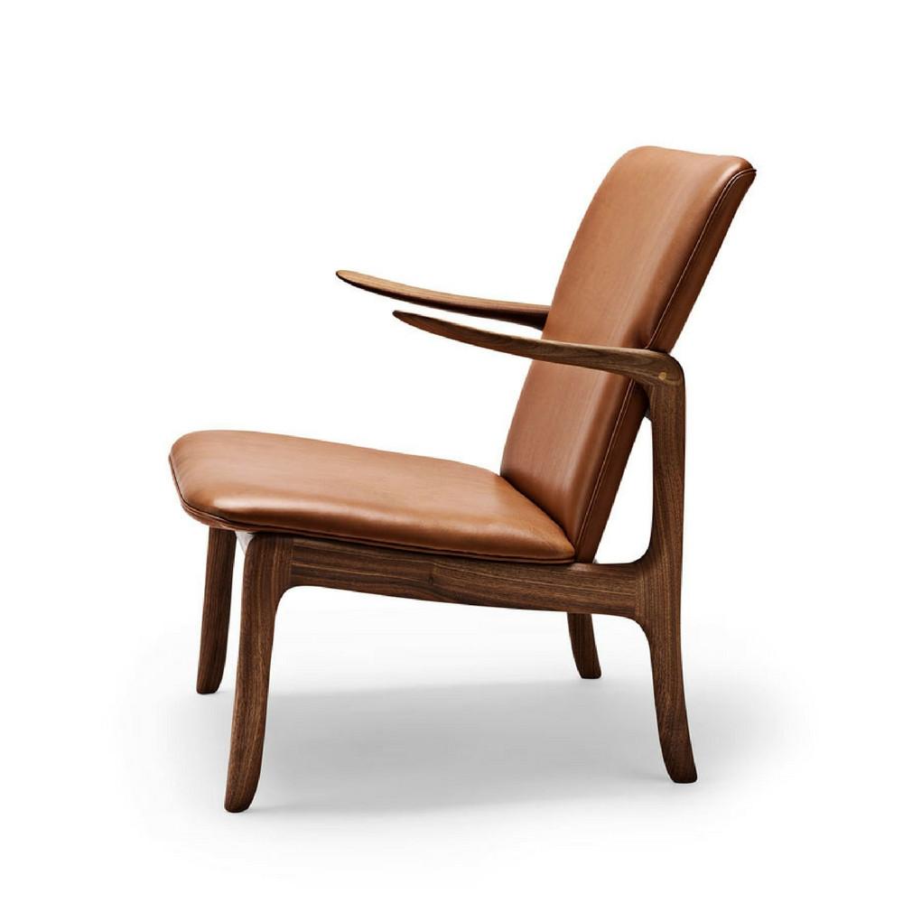 Ole Wanscher Beak chair in cognac leather with walnut frame side view Carl Hansen and Son