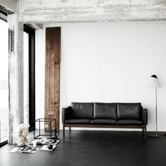Wegner CH163 Sofa in Black Sif Leather in living room Carl Hansen & Son