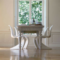 White Panton Chairs With Marble Dining Table in Classic Dining Room Vitra