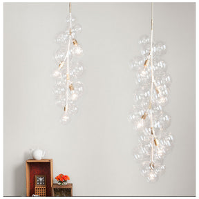 PELLE Tall Bubble Chandeliers in situ