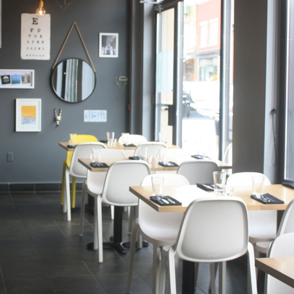 Philippe Starck Broom Stacking Chairs in Carben Restaurant in Ottawa, Canada by One80