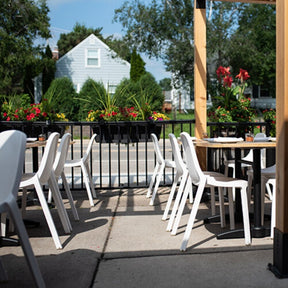 Philippe Starck Broom Stacking Chairs at Lola Pizzeria Minnesota by Studio Grey  photo by Rachel Lea