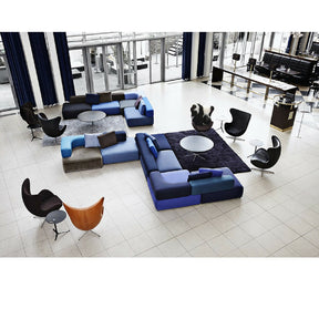 Blue Piero Lissoni Alphabet Sofa in Lobby with Egg Chairs Fritz Hansen