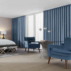 Precedent Hunter Chairs in KnollTextiles Blue Velvet with Platner Dining Table in Hotel Room