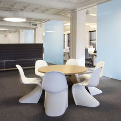 Prouve Gueridon Table in Office with white Panton Chairs Vitra
