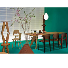 Prouve Tabouret Solvay Stools Stacked in Green Room with Gueridon Table Vitra