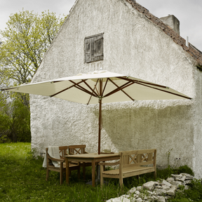 Atlantis Square Umbrella with Drachman Bench, Chairs, and Table by Skagerak