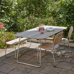 Skagerak Lilium DIning Table and Chairs with Punch and Flowers