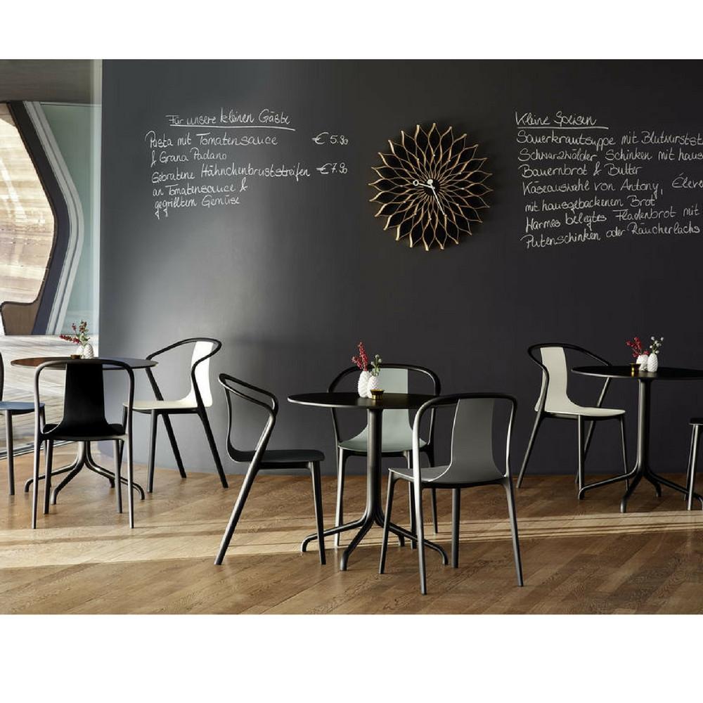 Vitra Bouroullec Belleville Chairs in Cafe with Nelson Sunflower Clock