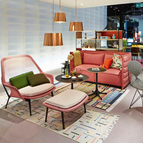 Vitra Bouroullec Slow Chair and Ottoman Red Cream in Room with Alcove Sofa