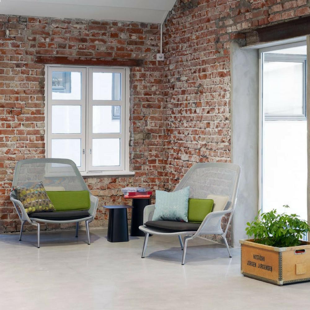 Vitra Bouroullec Slow Chairs in Loft with Exposed Brick