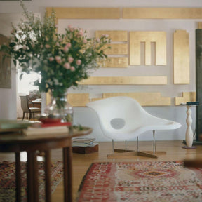Vitra Eames La Chaise in Room with Art and Flowers