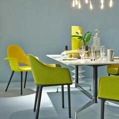 Eames Saarinen Organic Chair in Bright Yellow in room with Bouroullec Softshell Dining Chairs Salone di Mobile