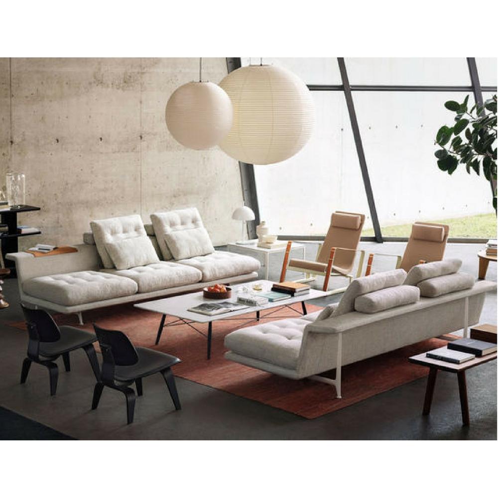 Vitra Antonio Citterio Grand Sofas in room with Prouve Cite Chairs and Eames Chairs