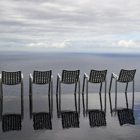 Vitra Landi Chairs by Hans Coray at water's edge