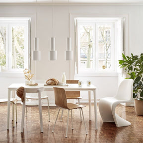 Vitra Panton Chair in dining room with HAL chairs and grenade pendant lights