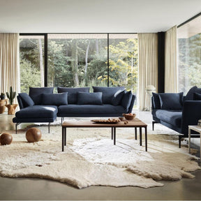 Vitra Suita Sofa by Antonio Citterio Dark Blue with Black Base in Living room